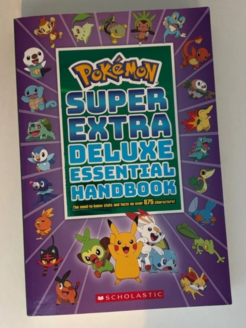 Scholastic Pokémon Super Extra Deluxe Essential Handbook - Purple & Teal